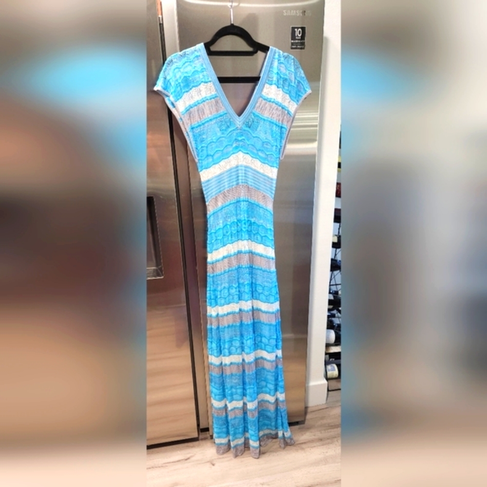 Bebe stretch sheer and lined blue maxi dress size M New without tags.